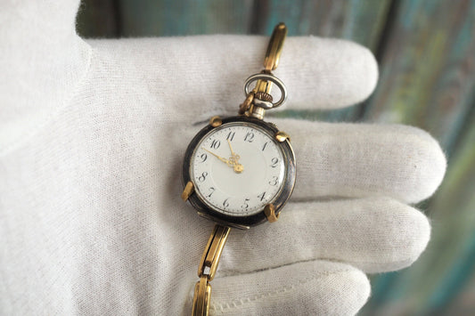 Antique  Swiss  ladies pocket watch  - silver nielo case , on a  wrist bracelet